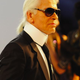 Illustration for article titled Karl Thinks Feminists Are Ugly; Posh Spice Gives Up On Armani